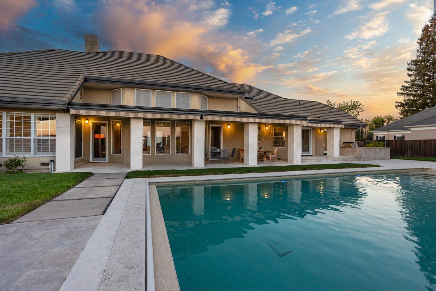 808 Country Club Drive Modesto, CA 95356 - Photo 9 of 60 a front view of a house with swimming pool