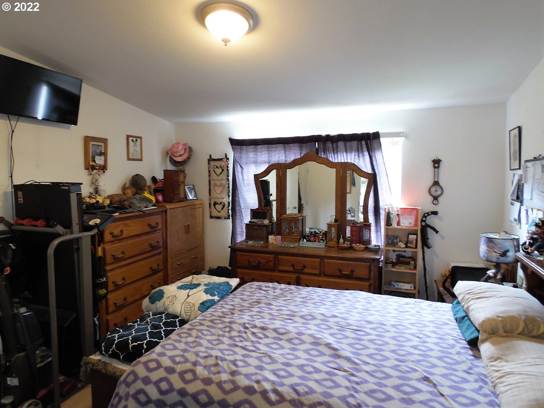 198 Council Creek Road Riddle, OR 97469 - Photo 12 of 24 a bedroom with a bed and furniture