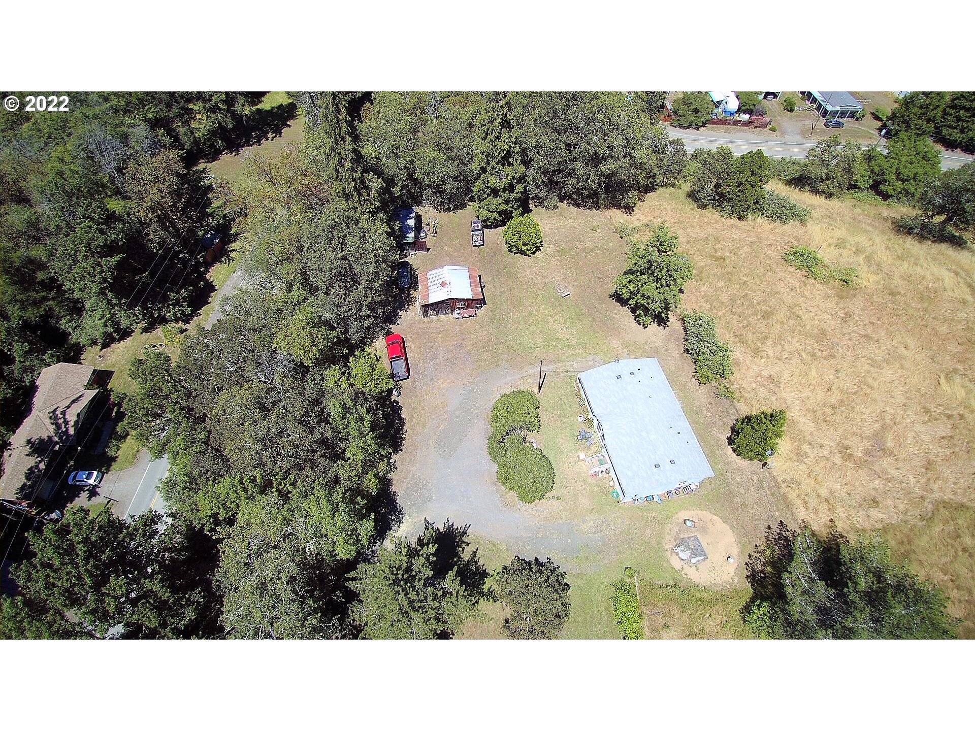 198 Council Creek Road Riddle, OR 97469 - Photo 5 of 24 a picture of a house with a outdoor space