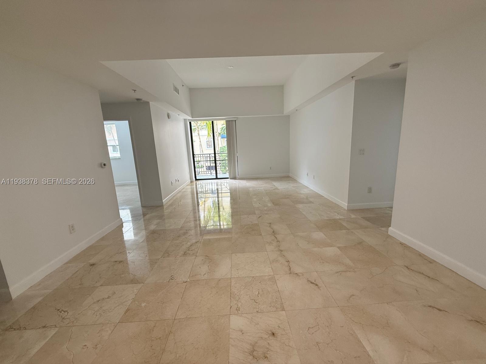 8390 Southwest 72nd Avenue, Unit 520 Miami, FL 33143 - Photo 19 of 61 an empty room with windows