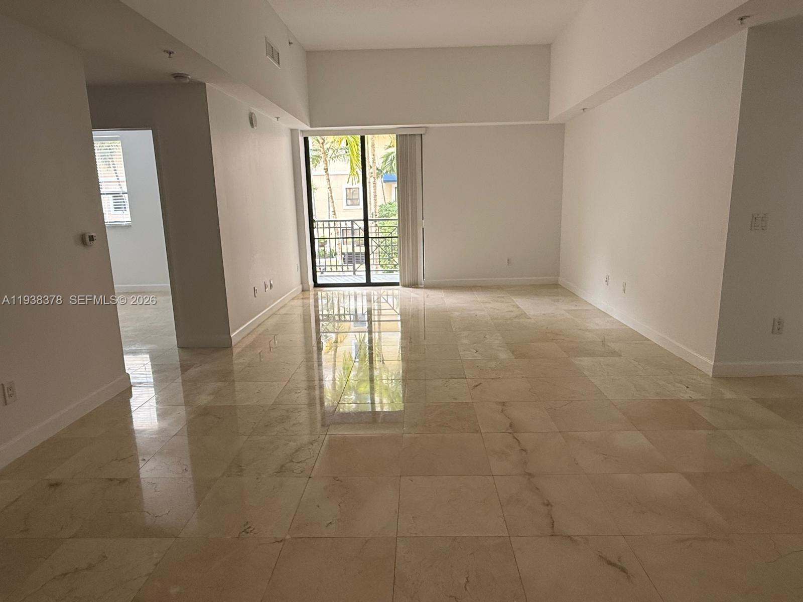 8390 Southwest 72nd Avenue, Unit 520 Miami, FL 33143 - Photo 20 of 61 an empty room with windows