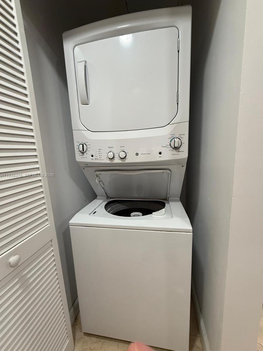 8390 Southwest 72nd Avenue, Unit 520 Miami, FL 33143 - Photo 57 of 61 a close up view of washer and dryer