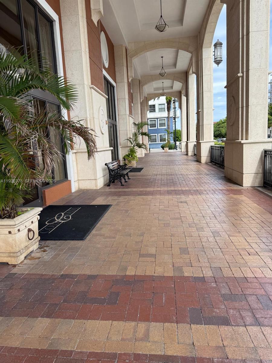 8390 Southwest 72nd Avenue, Unit 520 Miami, FL 33143 - Photo 6 of 61 a view of a building along with street