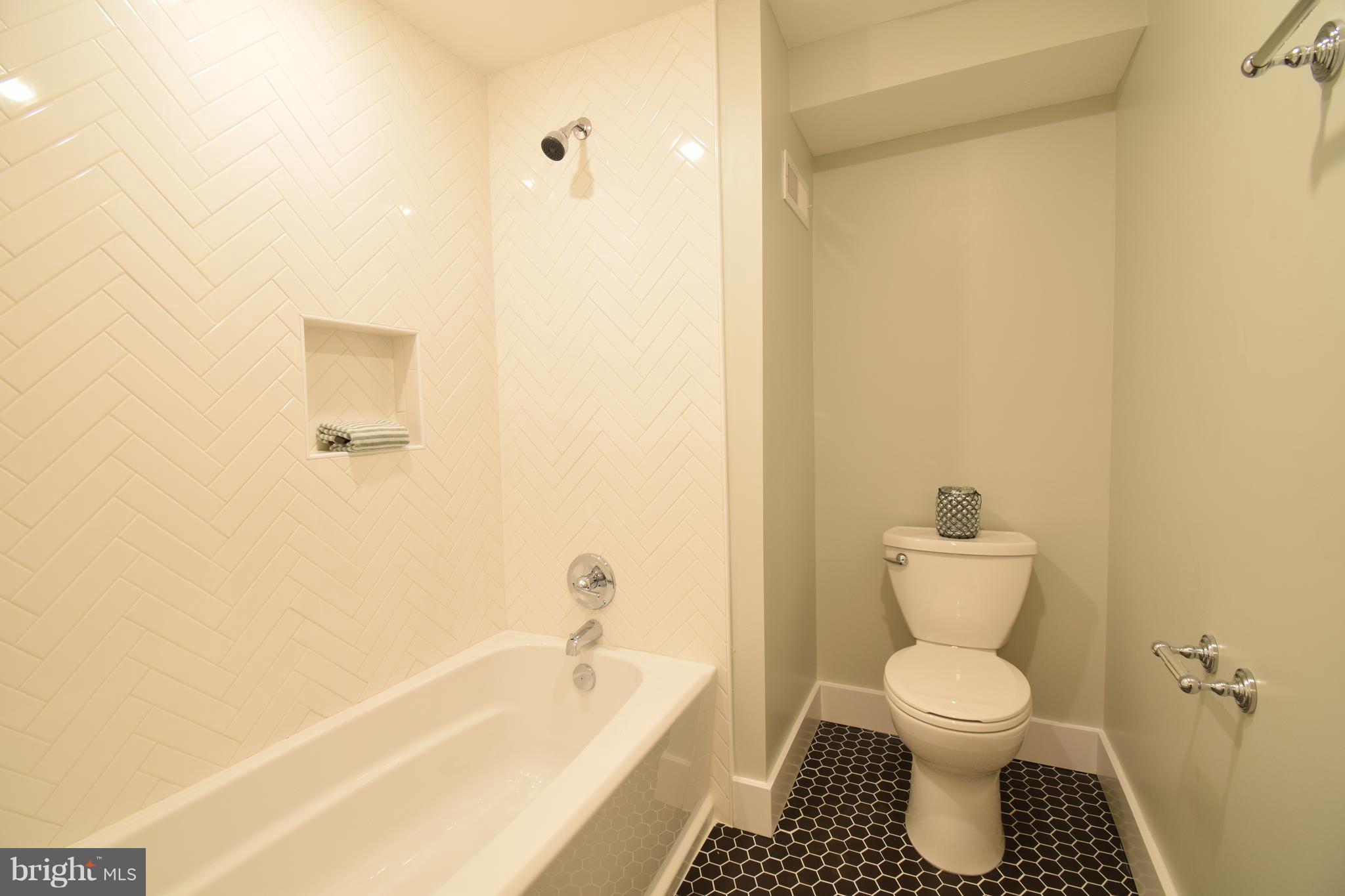 516 Pafel Road Annapolis, MD 21401 - Photo 25 of 30 Basement bath with fun tile work