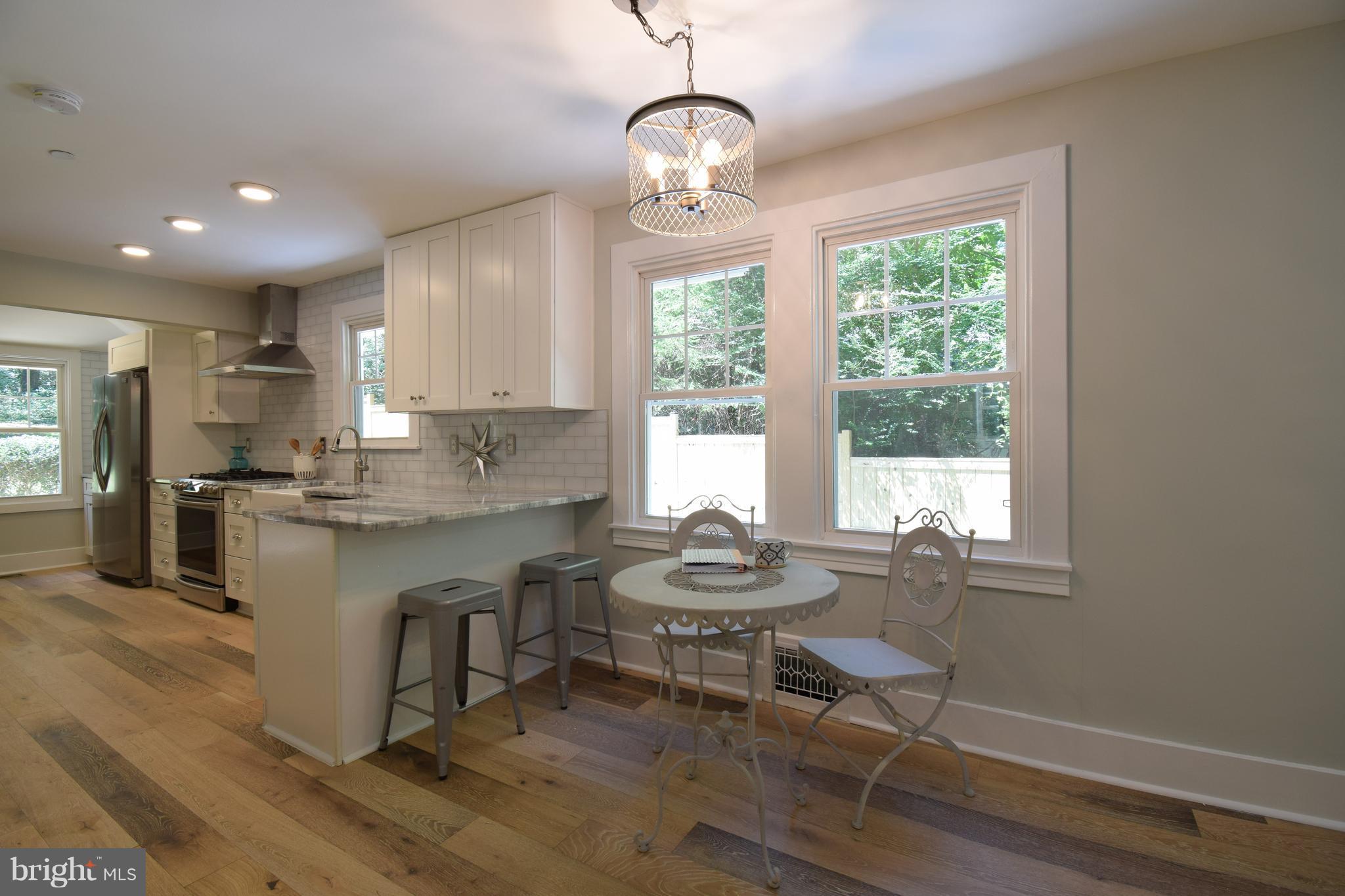 516 Pafel Road Annapolis, MD 21401 - Photo 5 of 30 Kitchen with custom farmhouse chandelier
