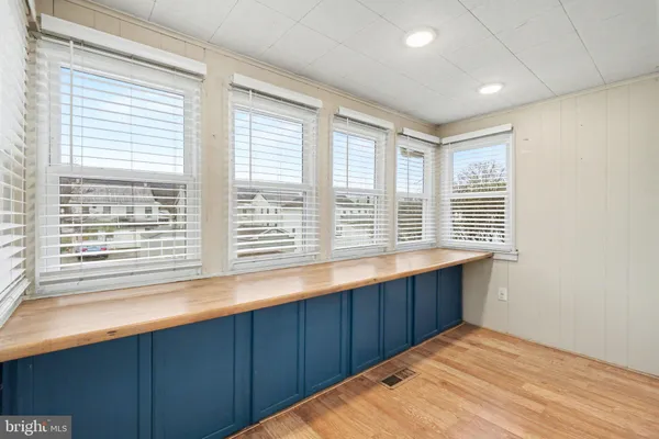 a view of kitchen with large windows