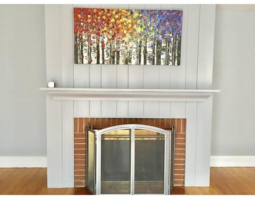 254 Green River Road Greenfield, MA 01301 - Photo 12 of 31 a close view of a fireplace with a hallway
