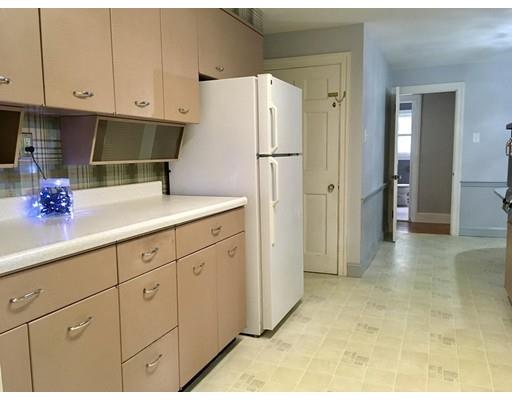254 Green River Road Greenfield, MA 01301 - Photo 17 of 31 a kitchen with cabinets and refrigerator