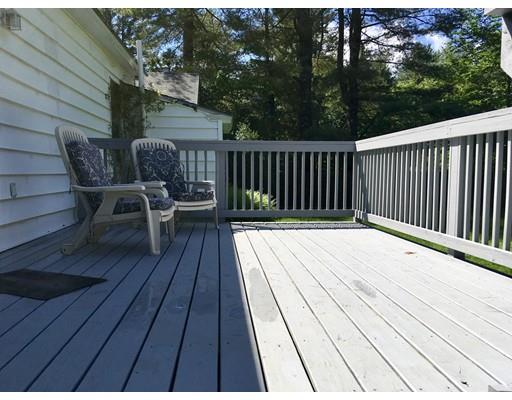 254 Green River Road Greenfield, MA 01301 - Photo 6 of 31 a view of balcony with wooden floor and outdoor seating