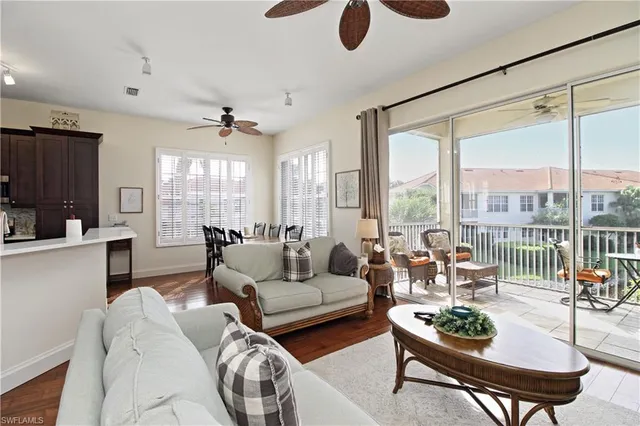 a view of a livingroom with furniture and a table