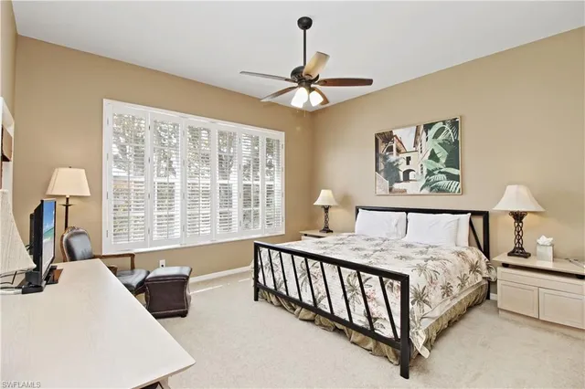 a spacious bathroom with a sink a mirror and a bathtub