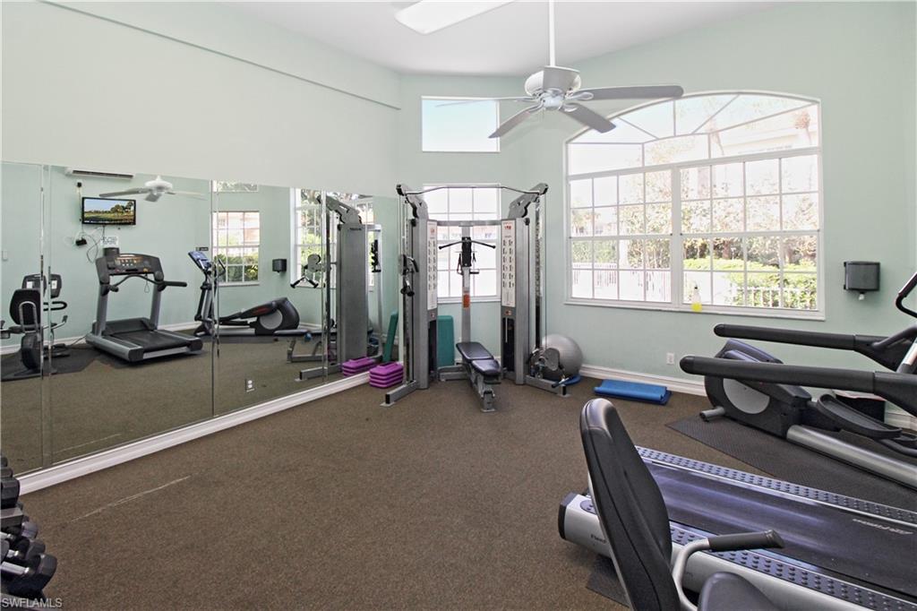 970 Egrets Run, Unit 201 Naples, FL 34108 - Photo 35 of 50 a view of a room with gym equipment