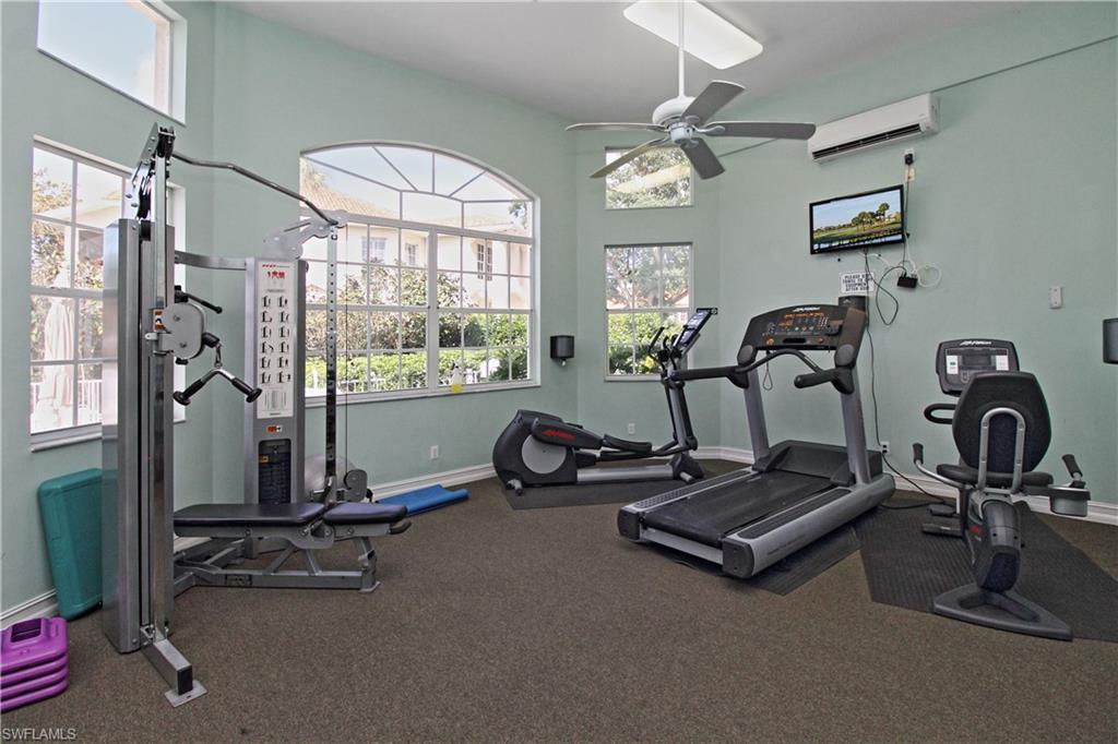 970 Egrets Run, Unit 201 Naples, FL 34108 - Photo 36 of 50 a view of a room with gym equipment