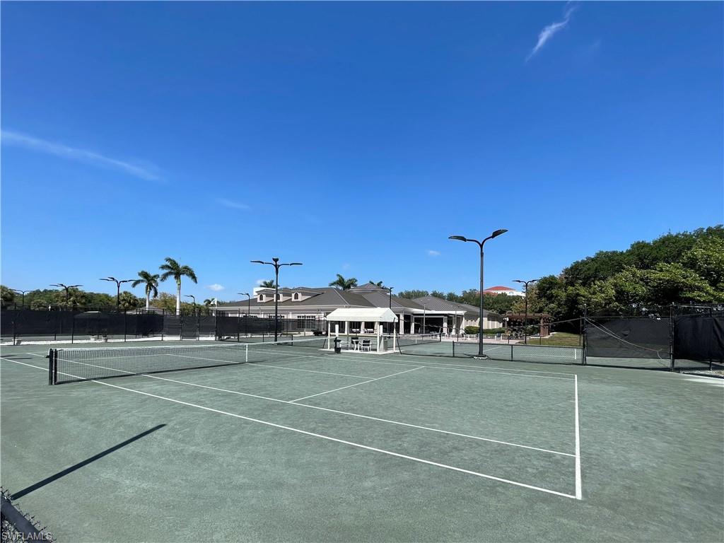 970 Egrets Run, Unit 201 Naples, FL 34108 - Photo 40 of 50 a view of a tennis court