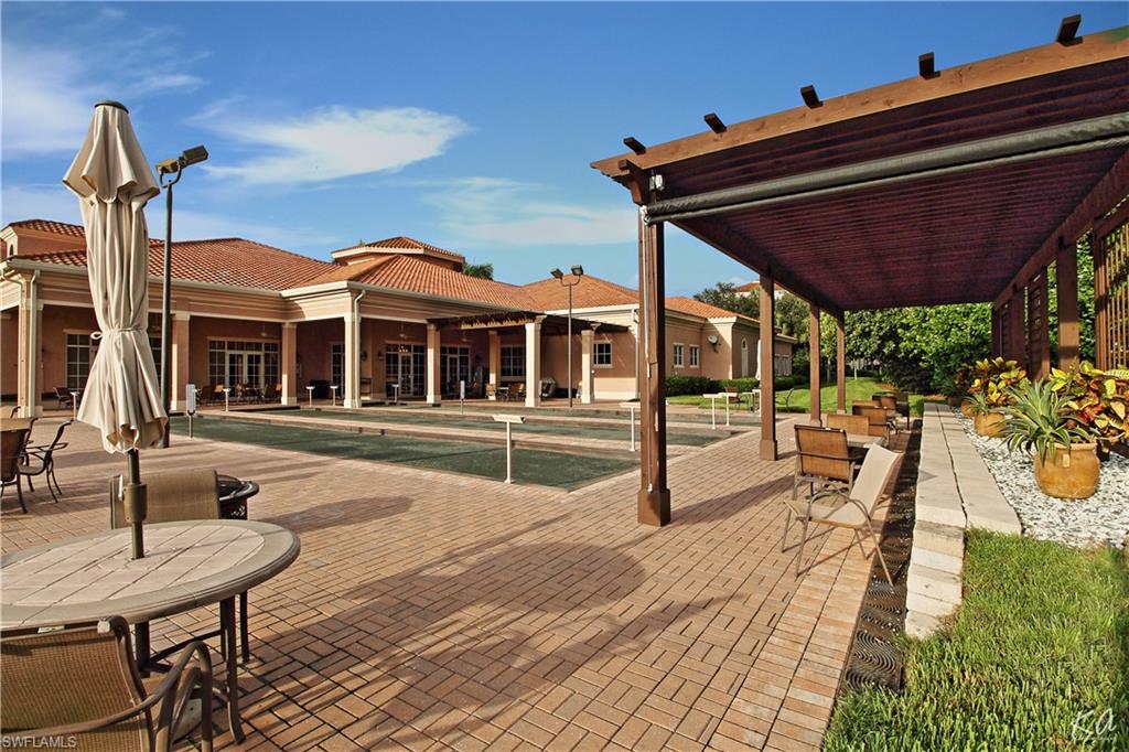 970 Egrets Run, Unit 201 Naples, FL 34108 - Photo 41 of 50 a view of a house with sitting area
