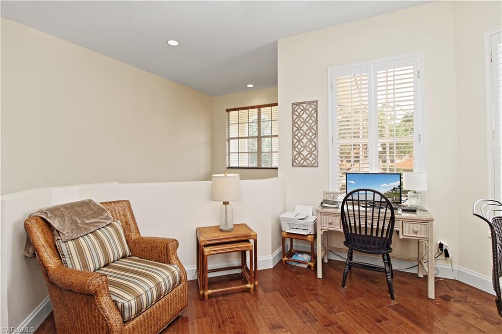 970 Egrets Run, Unit 201 Naples, FL 34108 - Photo 5 of 50 a living room with furniture and a window