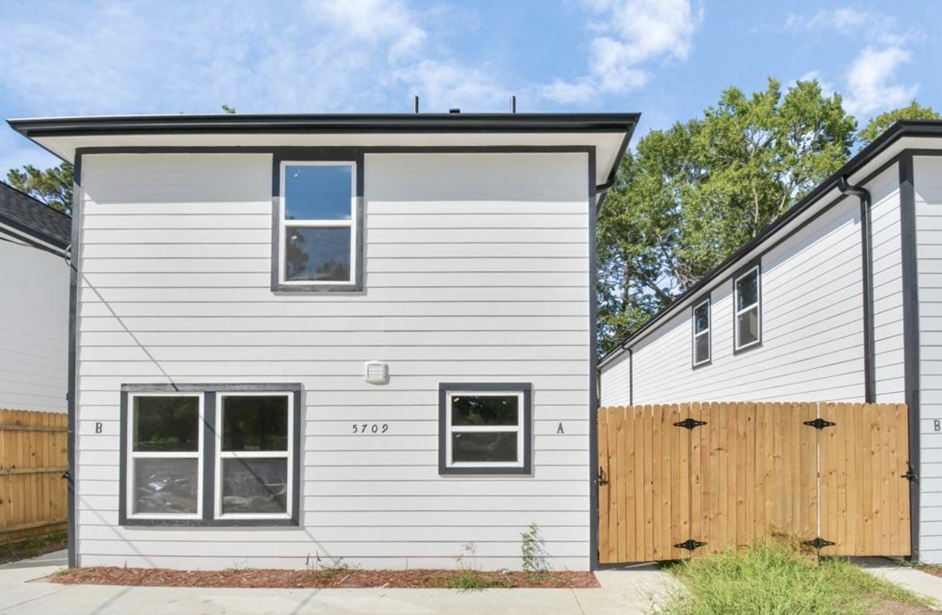 5709 Breland Street, Unit A Houston, TX 77016 - Photo 22 of 26 a view of a house with a garage