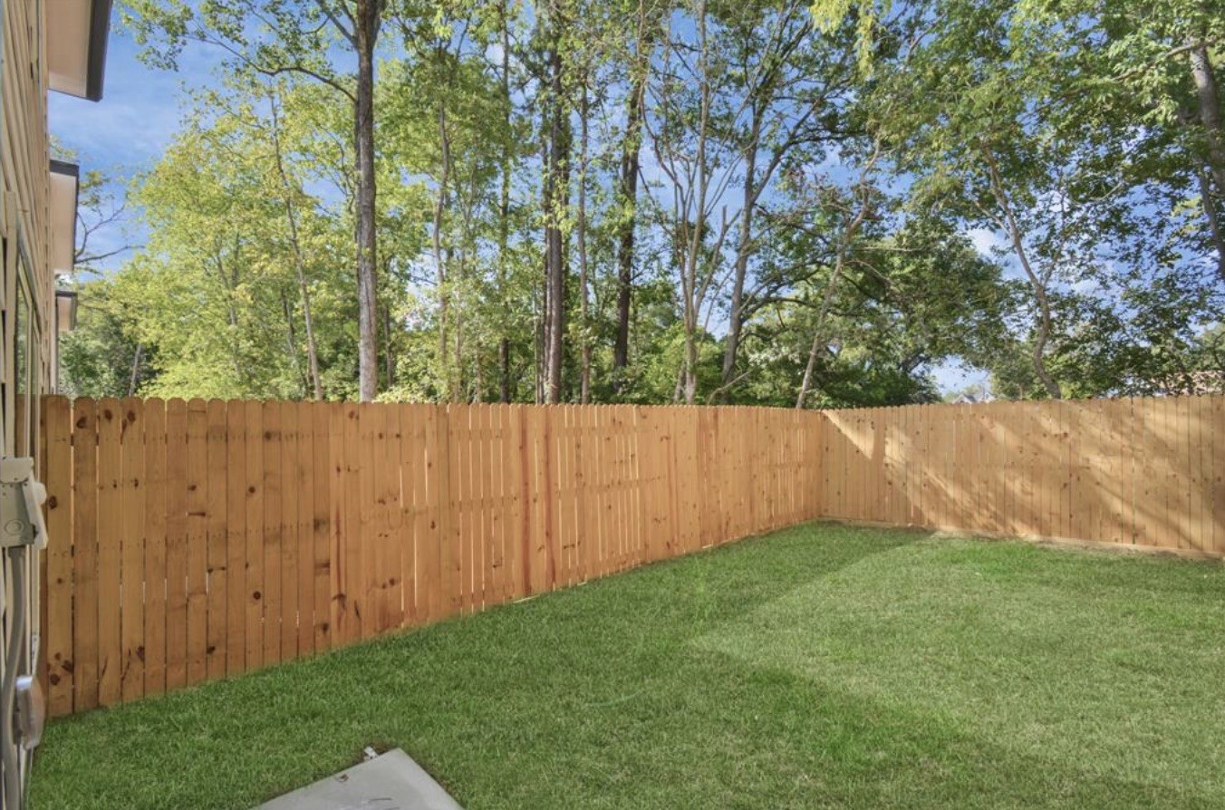 5709 Breland Street, Unit A Houston, TX 77016 - Photo 25 of 26 a view of an outdoor space and a yard