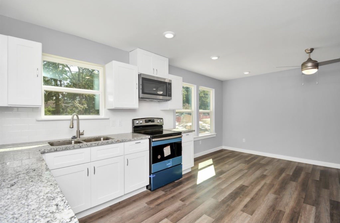 5709 Breland Street, Unit A Houston, TX 77016 - Photo 4 of 26 a kitchen with a sink appliances cabinets and a window