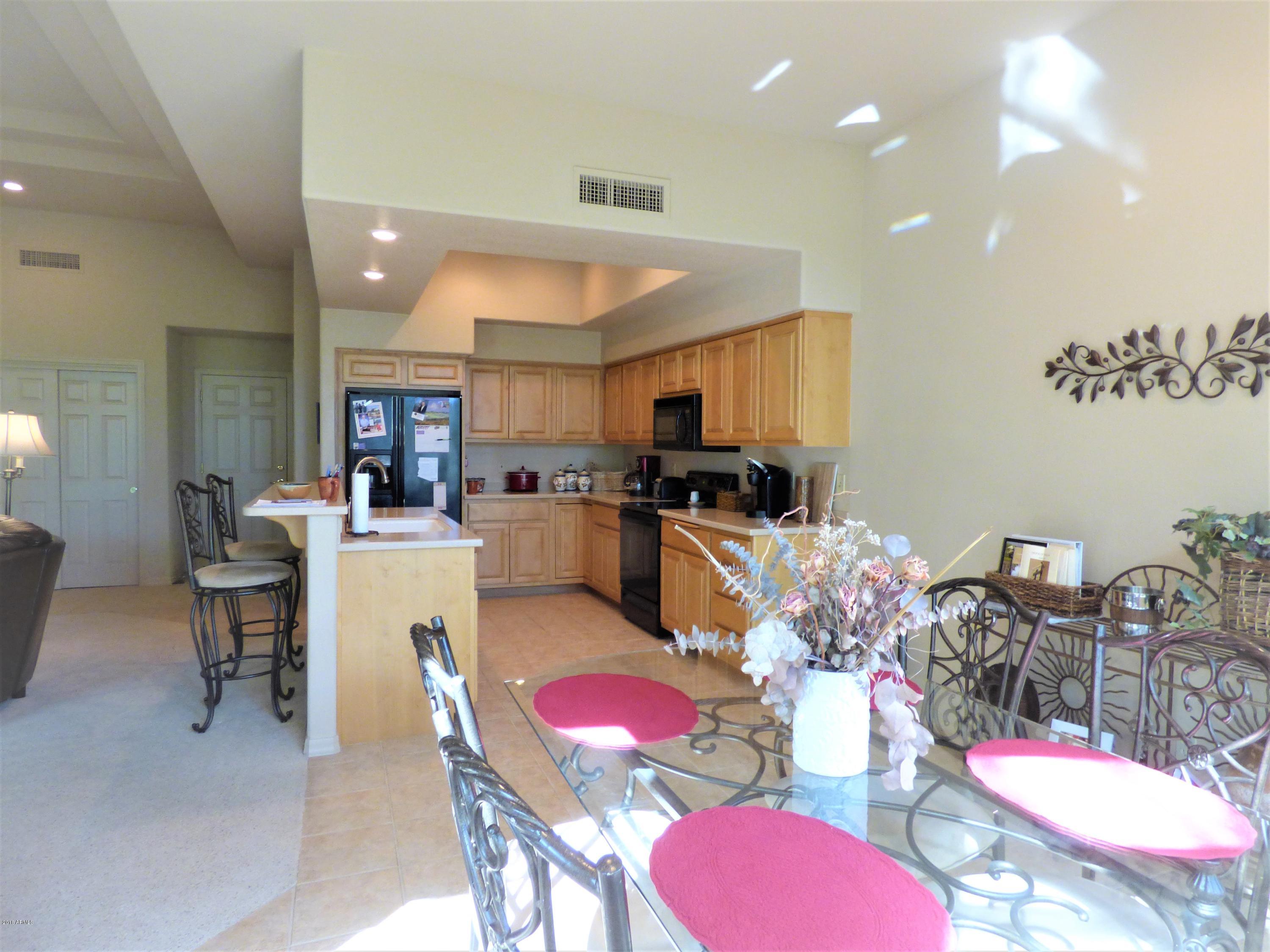 25621 North Sago Drive Rio Verde, AZ 85263 - Photo 29 of 29 Dining Room to Kitchen view