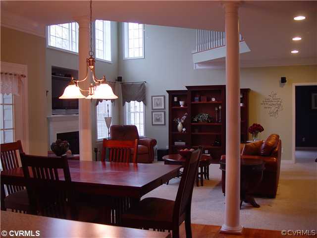 1307 Goswick Ridge Road Midlothian, VA 23114 - Photo 6 of 12 a view of a dining room with furniture and chandelier
