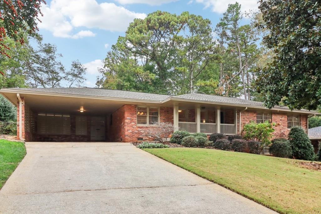 2720 Hunting Hill Lane Decatur, GA 30033 - Photo 1 of 1 a front view of a house with garden