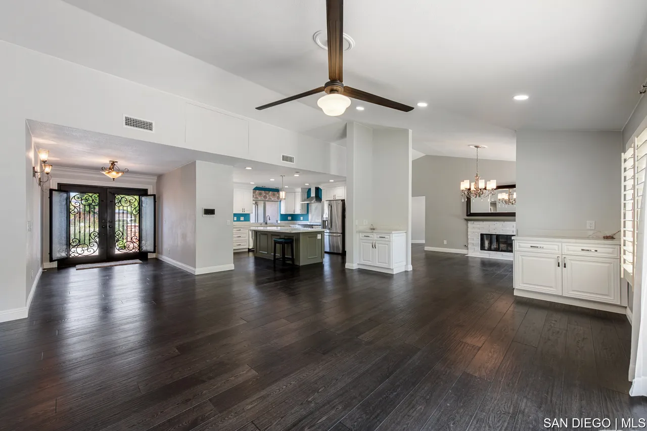 14001 Painted Desert Road Poway, CA 92064 - Photo 3 of 40 a view of an empty room with kitchen and window
