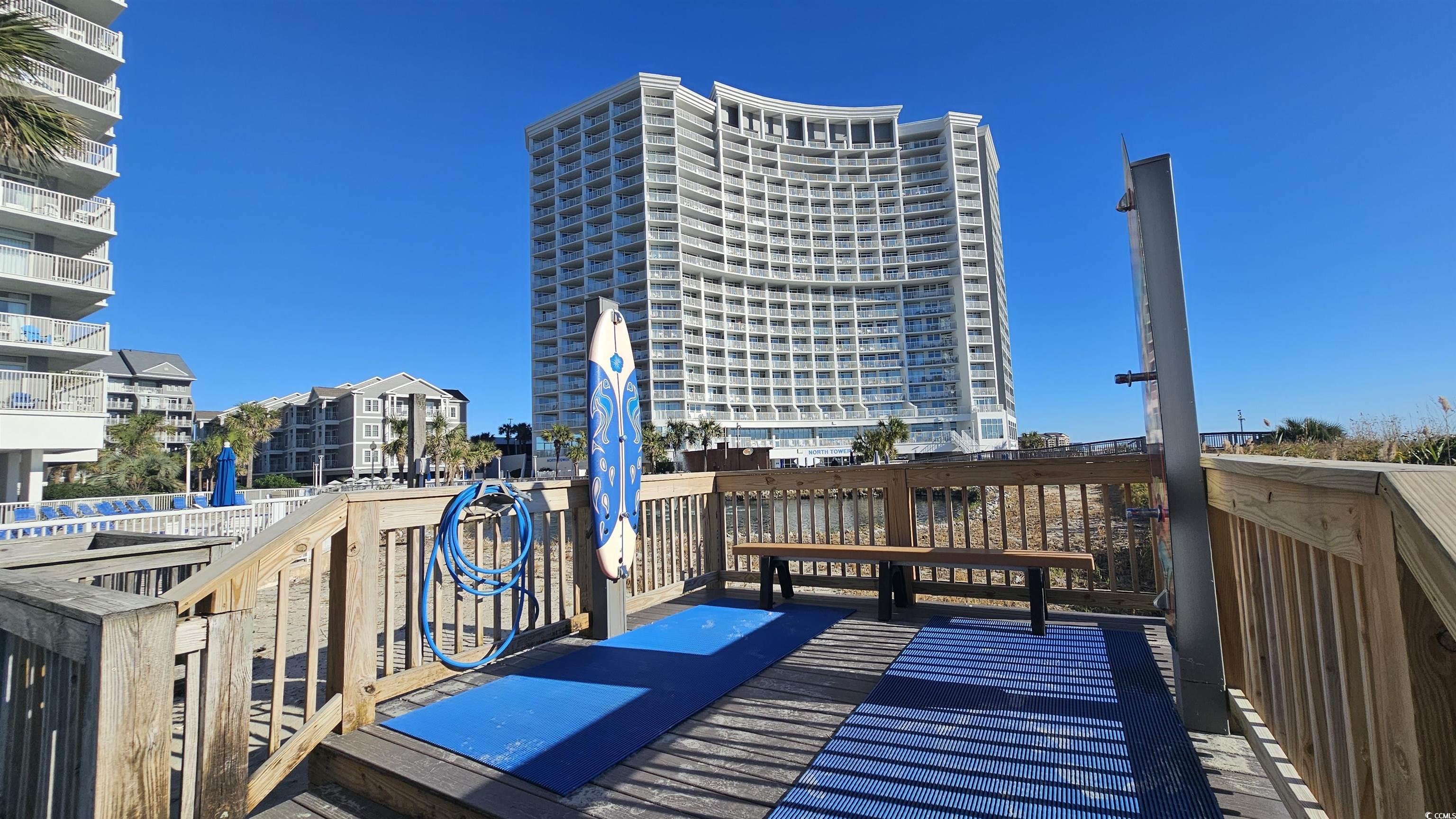 161 Seawatch Drive, Unit 610 Myrtle Beach, SC 29572 - Photo 21 of 35 Wooden deck with a view of city