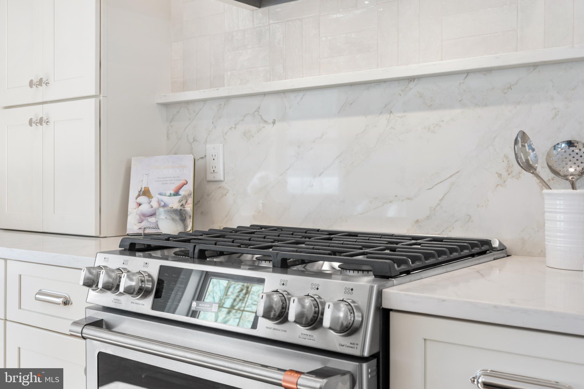 466 St Davids Avenue Wayne, PA 19087 - Photo 16 of 42 a white stove top oven sitting inside of a kitchen