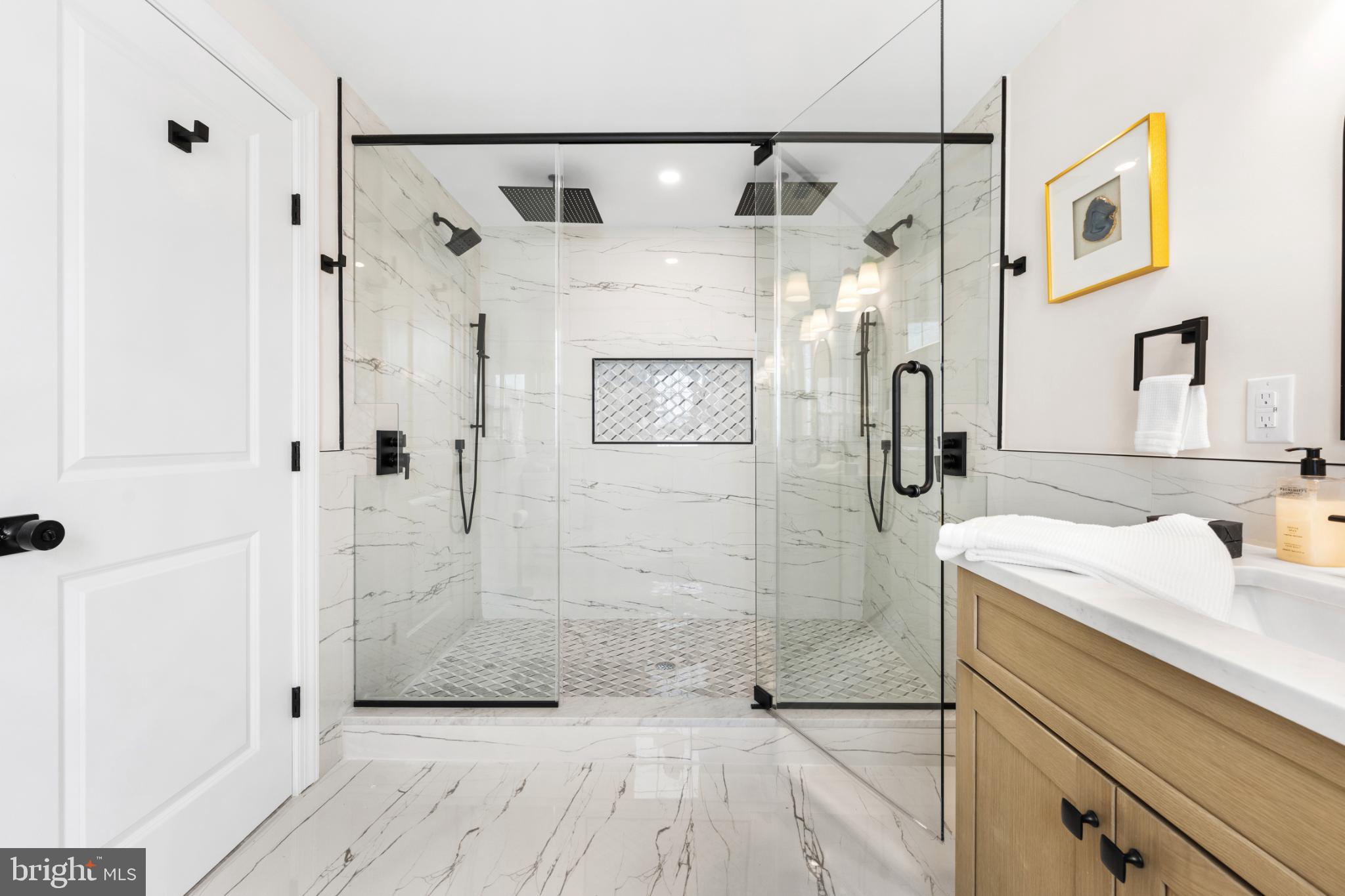 466 St Davids Avenue Wayne, PA 19087 - Photo 26 of 42 a bathroom with a granite countertop shower sink vanity and mirror