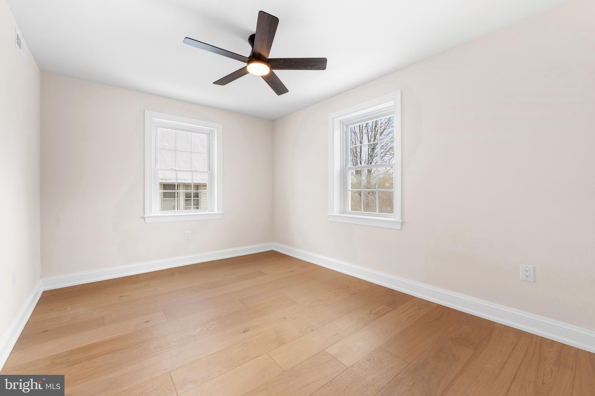 466 St Davids Avenue Wayne, PA 19087 - Photo 30 of 42 an empty room with window and ceiling fan