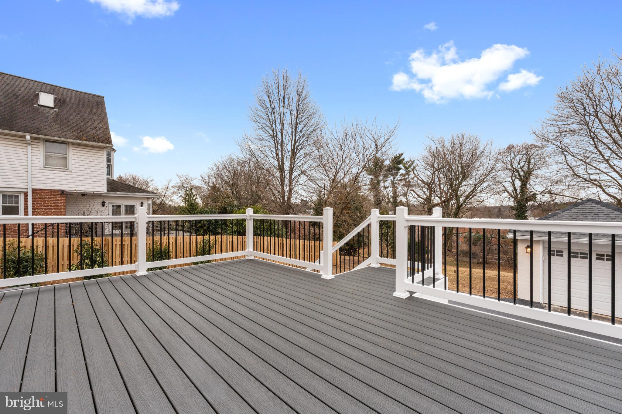 466 St Davids Avenue Wayne, PA 19087 - Photo 41 of 42 a view of a balcony with wooden floor and fence