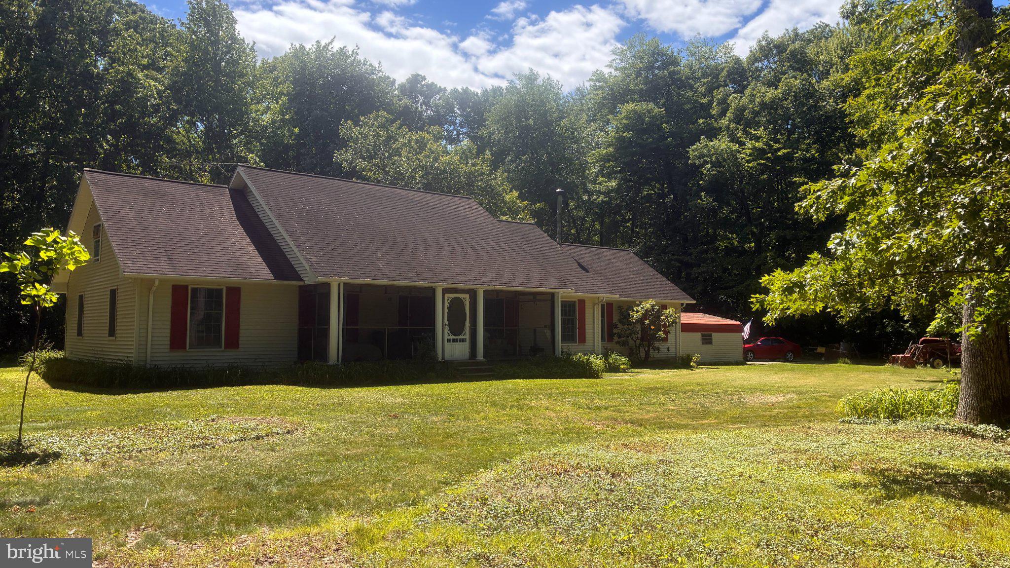 242 Firetower Road Camden Wyoming, DE 19934 - Photo 1 of 14 a view of a house with a yard