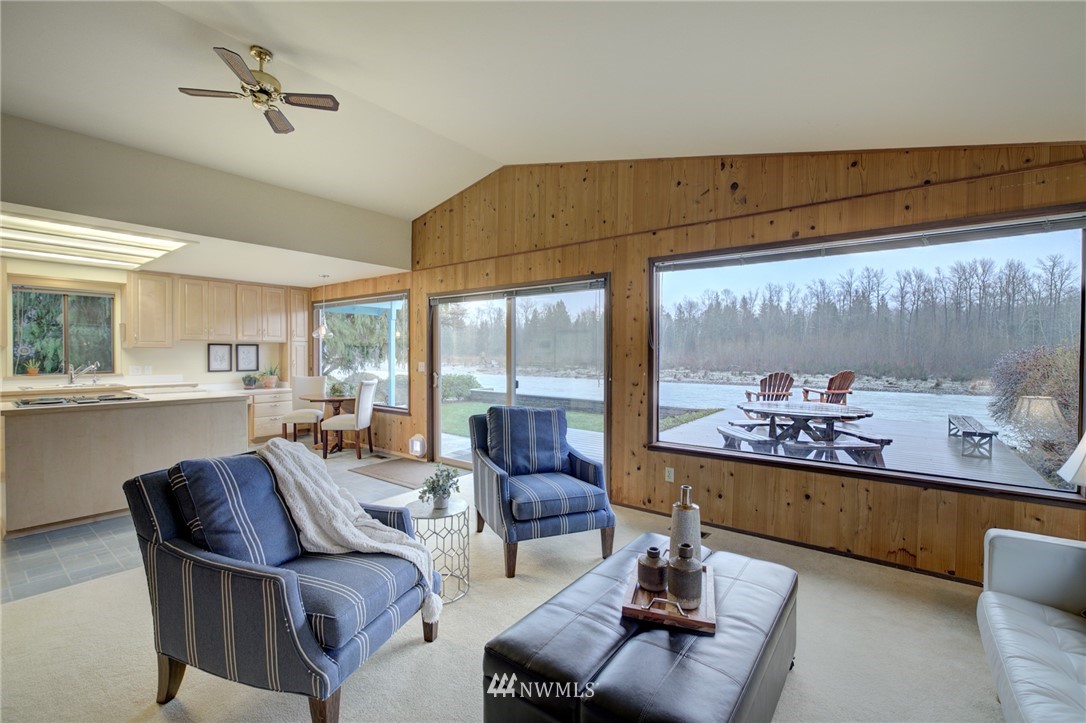 1104 Dyer Road Sultan, WA 98294 - Photo 2 of 40 a living room with furniture and a floor to ceiling window