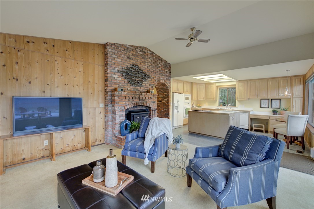 1104 Dyer Road Sultan, WA 98294 - Photo 12 of 40 a living room with furniture and a fireplace