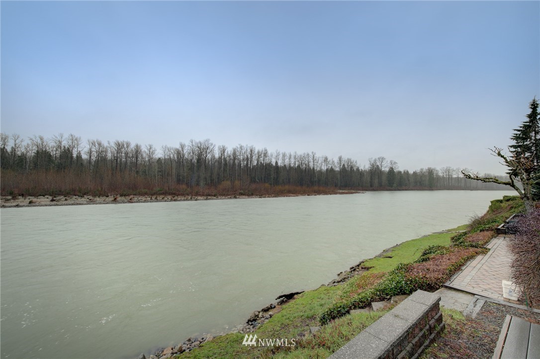 1104 Dyer Road Sultan, WA 98294 - Photo 16 of 40 a view of a lake with a city