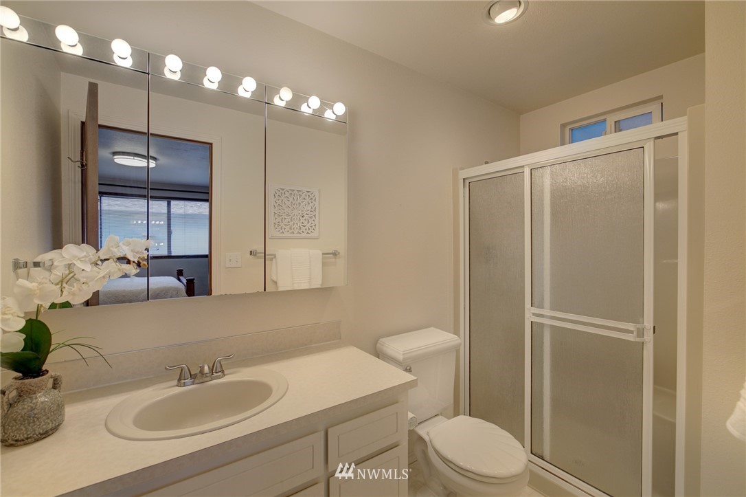 1104 Dyer Road Sultan, WA 98294 - Photo 27 of 40 a bathroom with a sink a toilet and shower