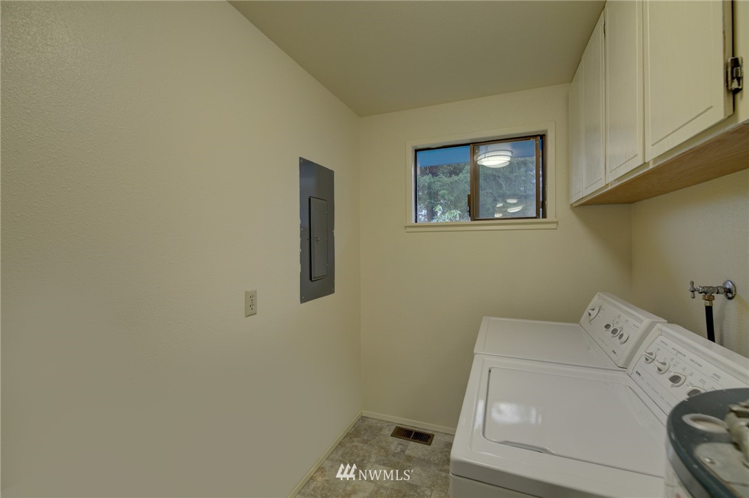 1104 Dyer Road Sultan, WA 98294 - Photo 32 of 40 a utility room with dryer and washer
