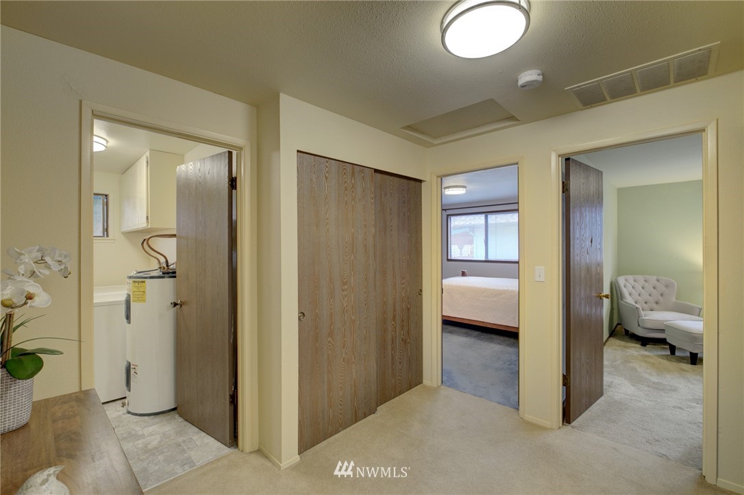 1104 Dyer Road Sultan, WA 98294 - Photo 33 of 40 a view of a hallway with living room and bathroom