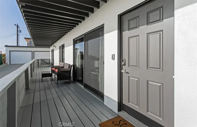 a view of a house with a barbeque