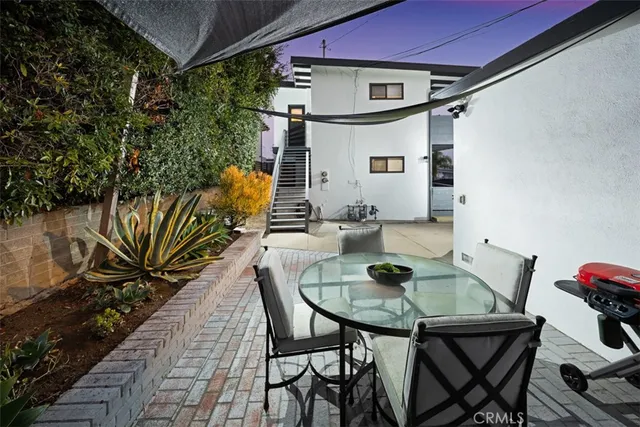 a view of a outdoor seating area with furniture