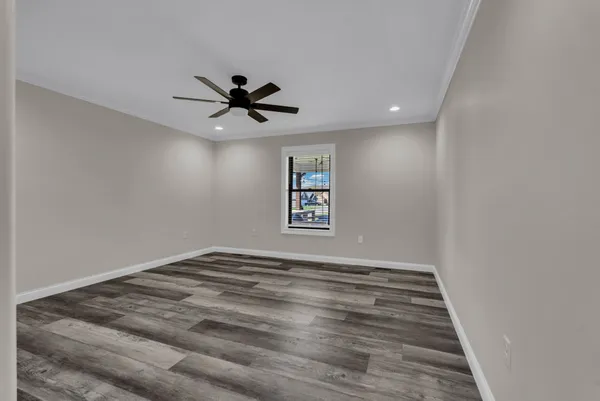 a view of a big room with carpet