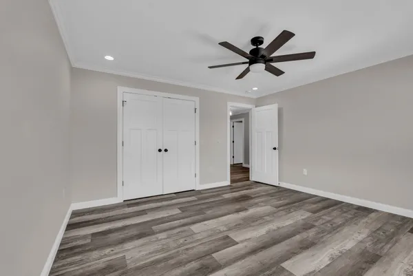 a view of a livingroom with a ceiling fan