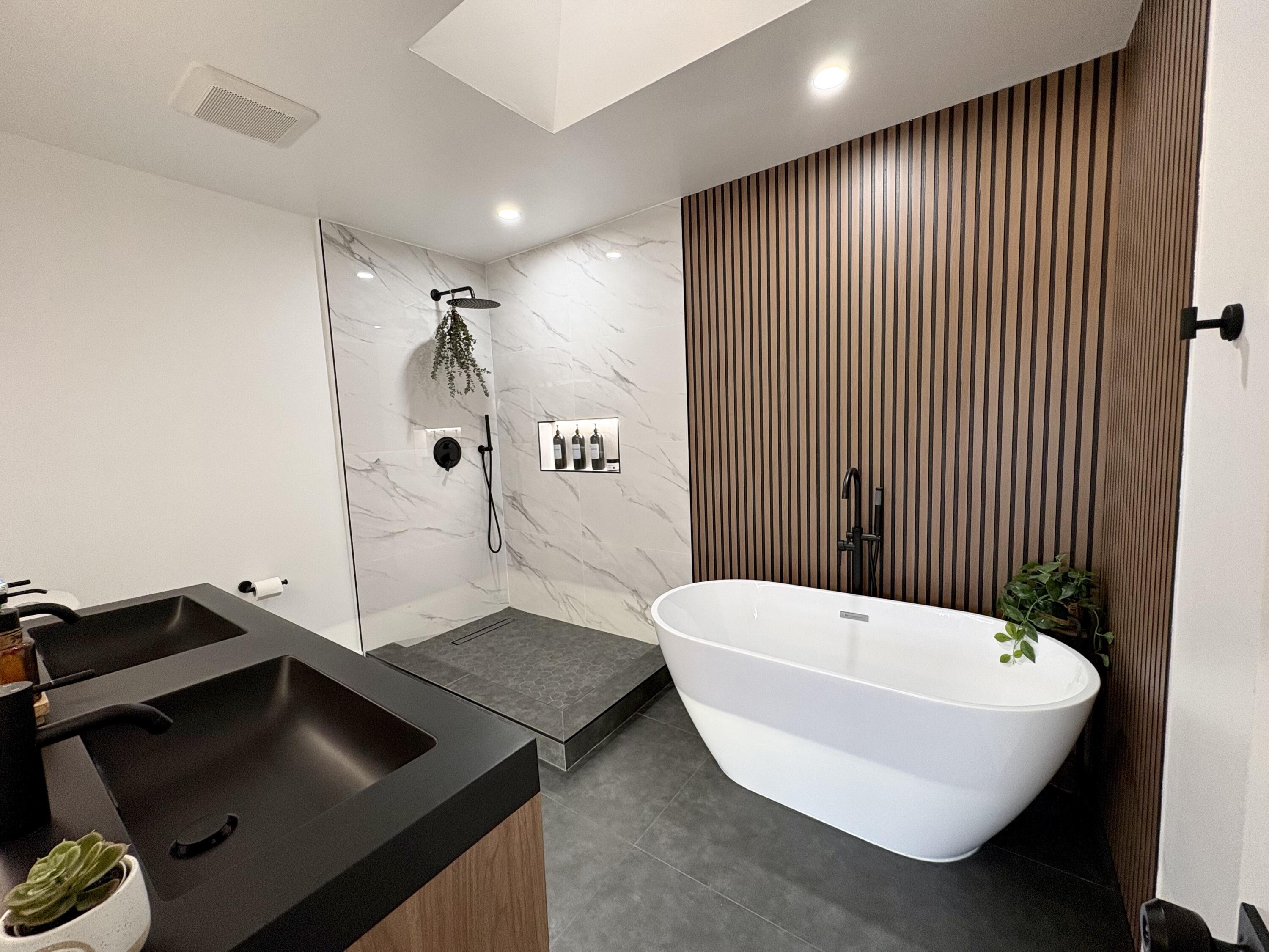 3 Kyle Way Boynton Beach, FL 33426 - Photo 24 of 36 a bathroom with a sink and mirror