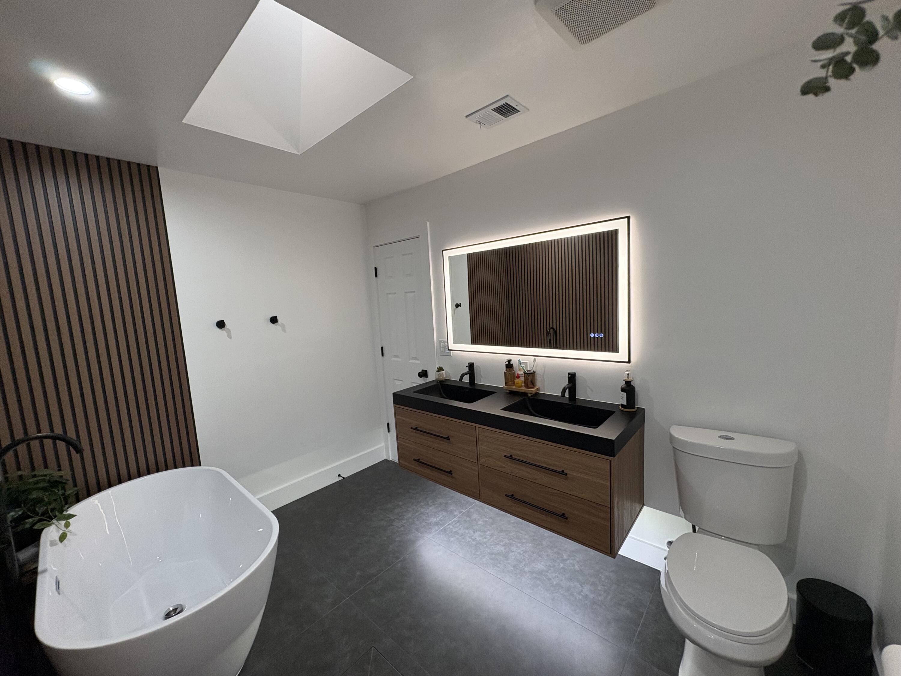 3 Kyle Way Boynton Beach, FL 33426 - Photo 25 of 36 a bathroom with a toilet sink and mirror