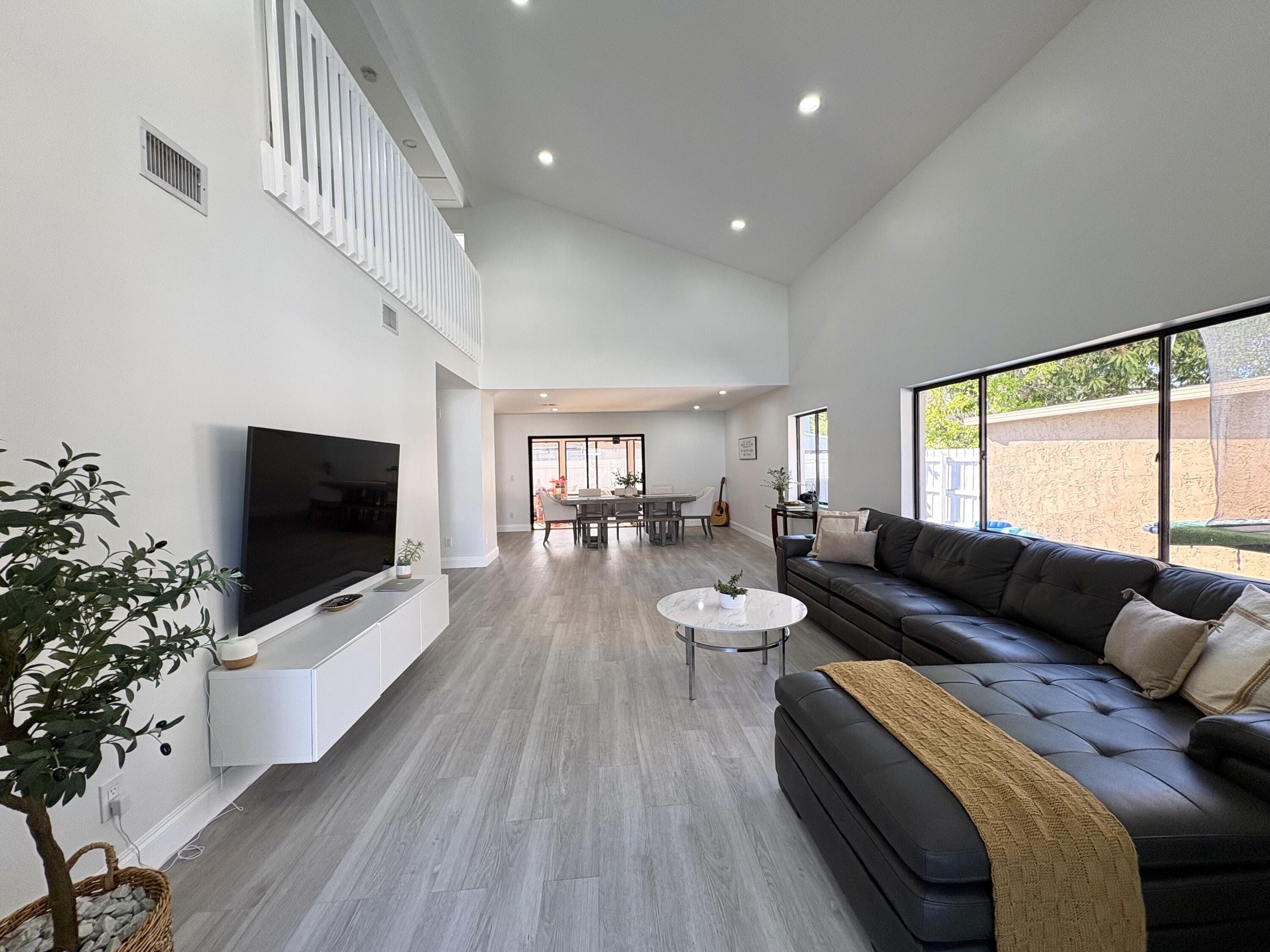 3 Kyle Way Boynton Beach, FL 33426 - Photo 3 of 36 a living room with furniture and a flat screen tv