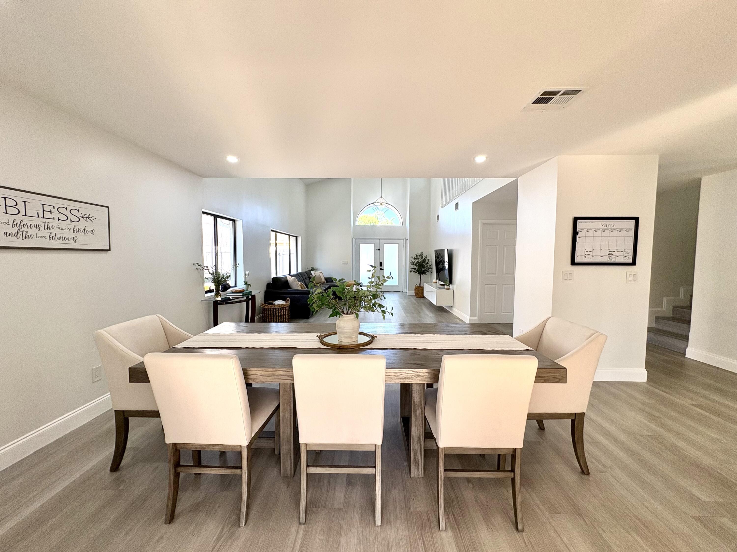 3 Kyle Way Boynton Beach, FL 33426 - Photo 7 of 36 a dining room with furniture and wooden floor