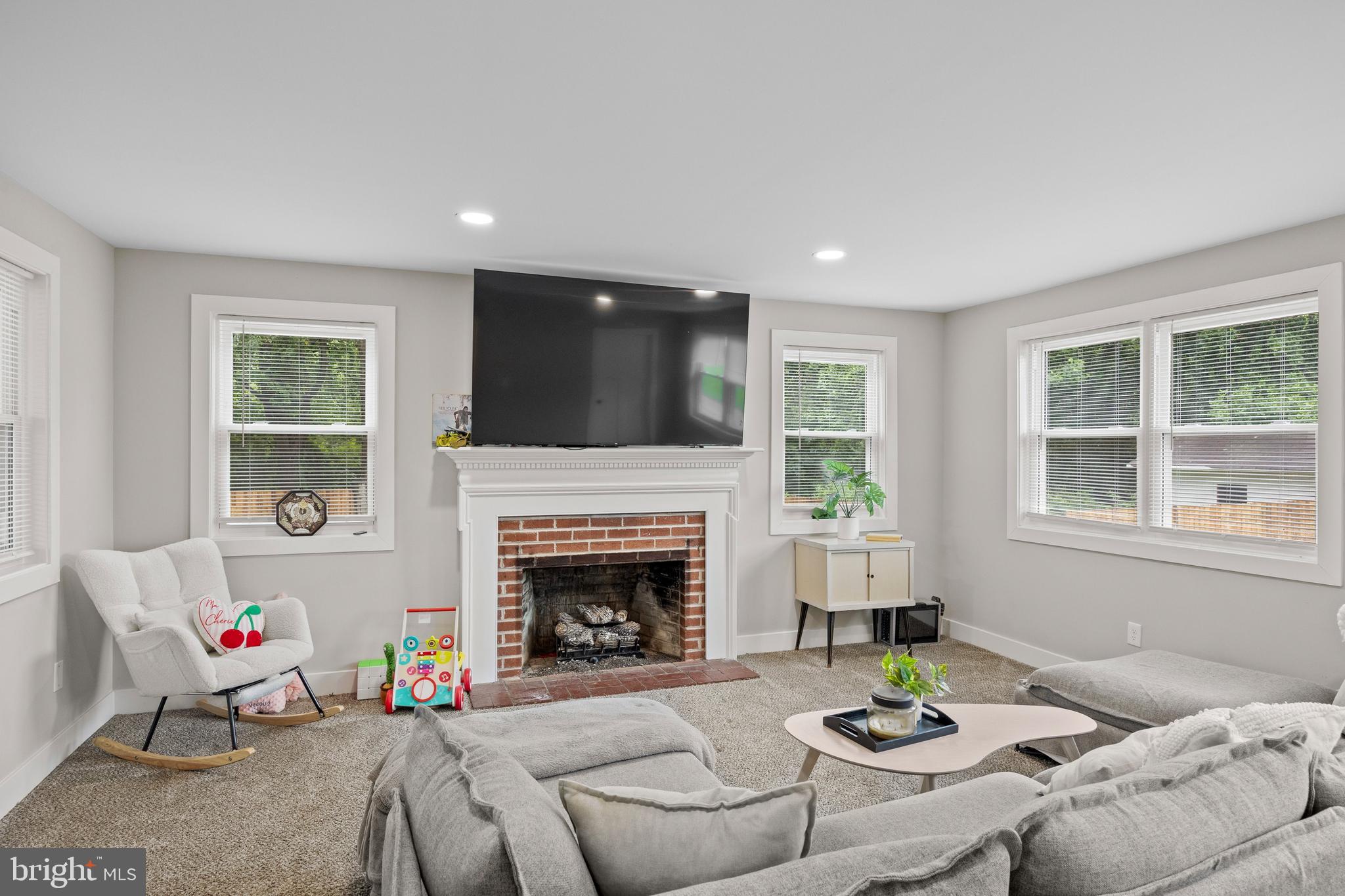 218 Pleasant Mills Road Hammonton, NJ 08037 - Photo 17 of 36 a living room with furniture and a fireplace