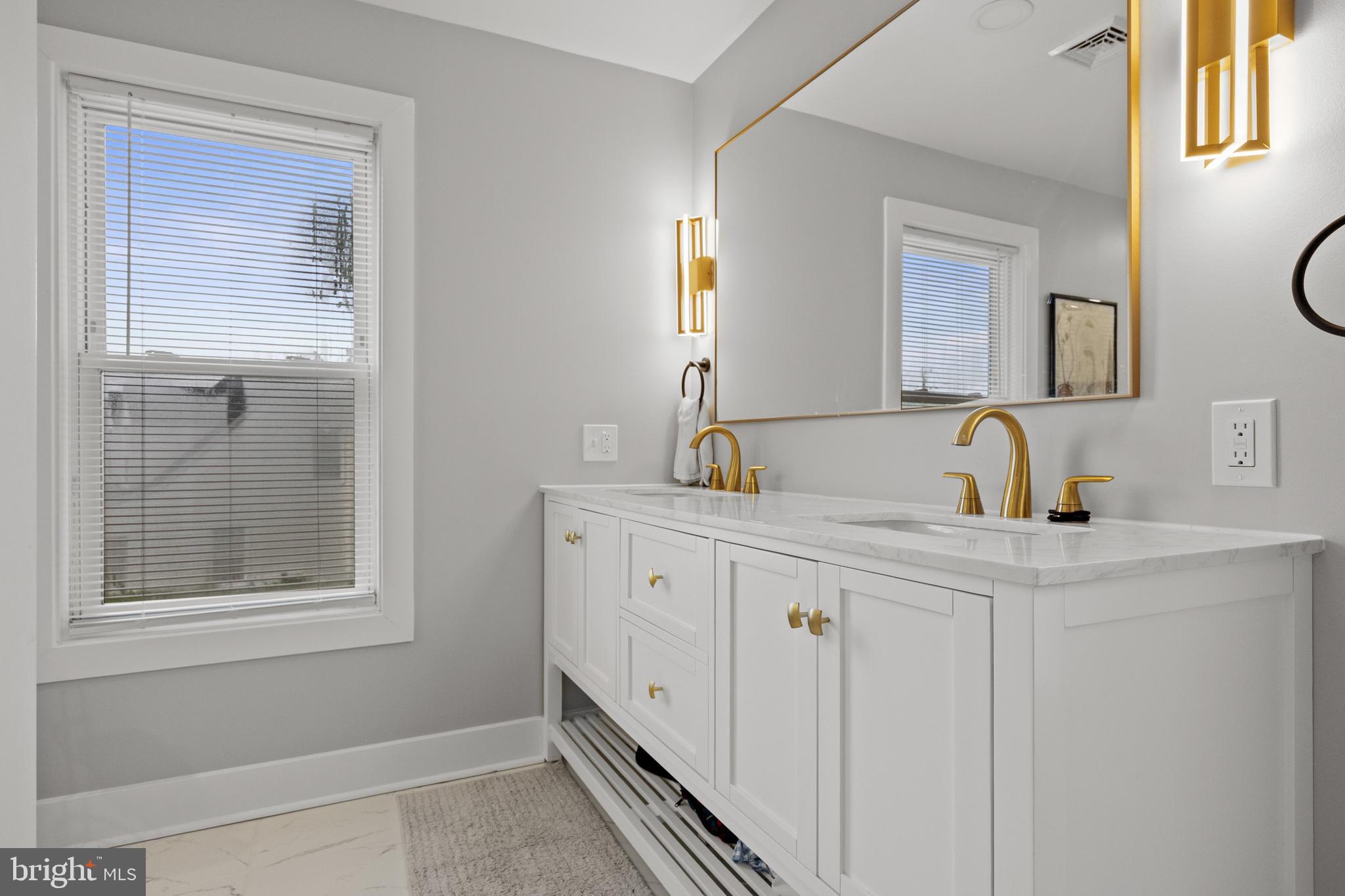 218 Pleasant Mills Road Hammonton, NJ 08037 - Photo 22 of 36 a bathroom with a sink and a mirror