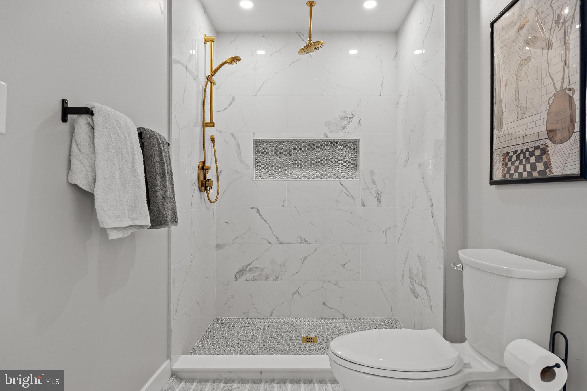 218 Pleasant Mills Road Hammonton, NJ 08037 - Photo 24 of 36 a bathroom with a toilet sink and shower